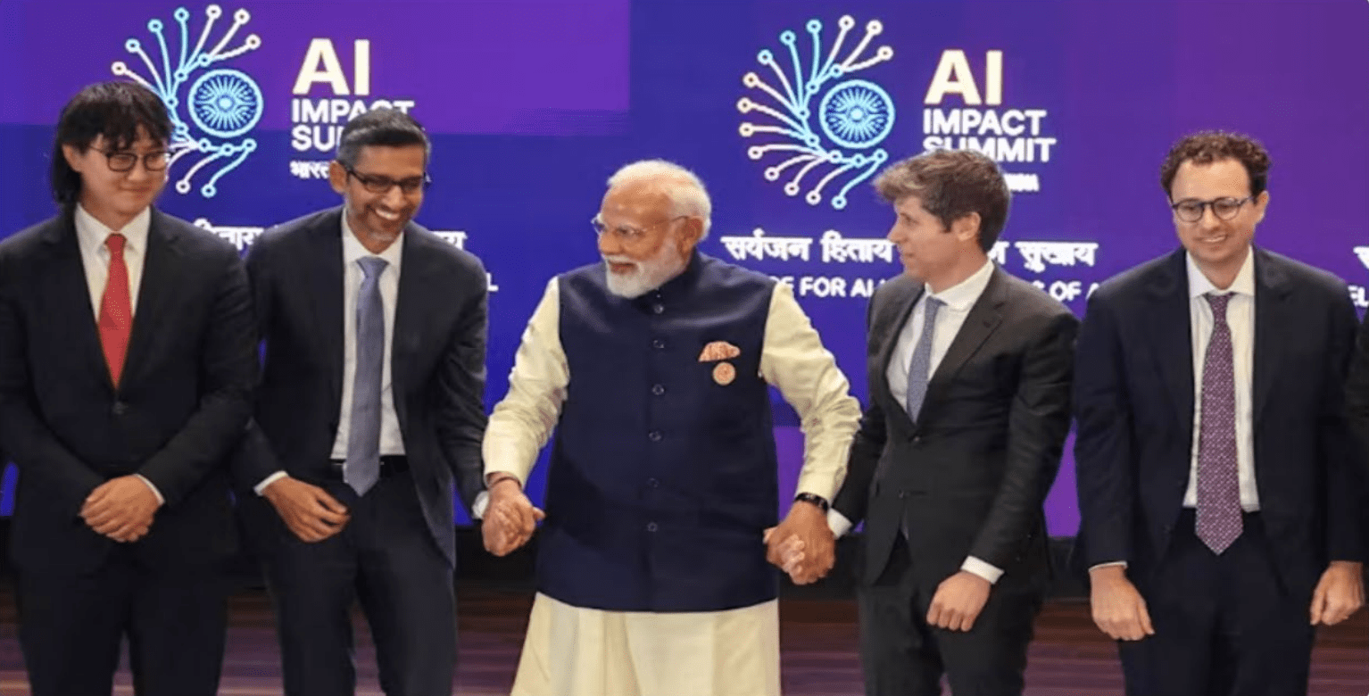 India is having its AI moment at global summit, India's Prime Minister Narendra Modi takes a group photo with AI company leaders including OpenAI CEO Sam Altman, Anthropic CEO Dario Amodei and Google CEO Sundar Pichai