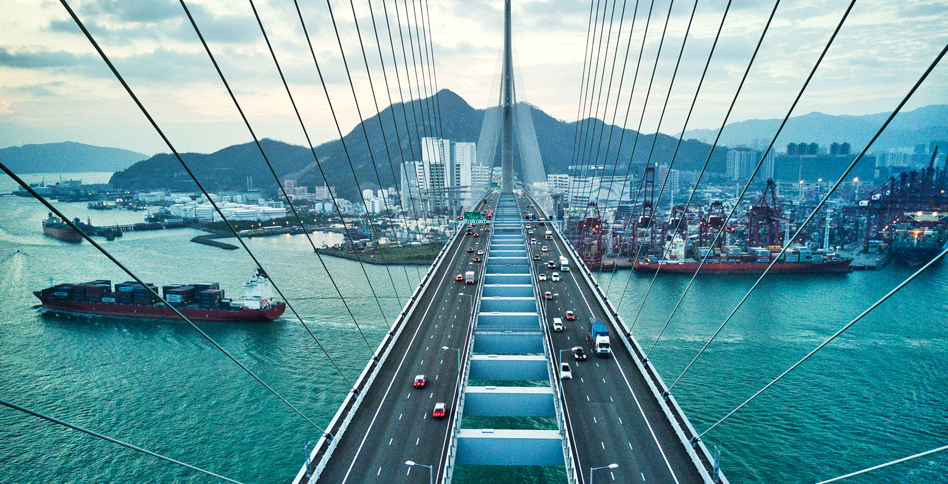 Bridge in Hong Kong and Container Cargo freight ship