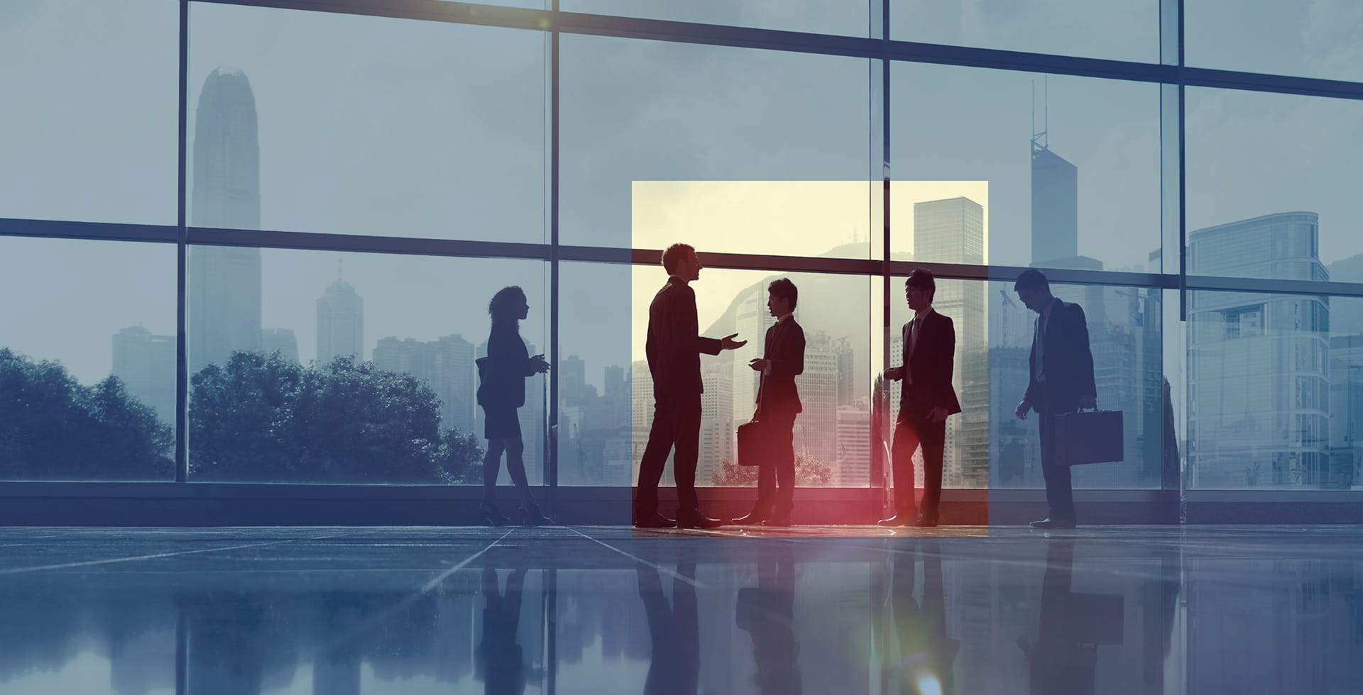 Business people meeting against a skyline